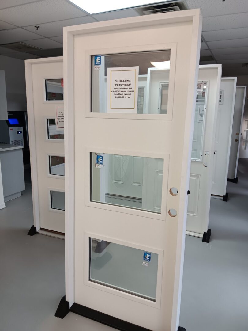 door with three glass inserts displayed in warehouse