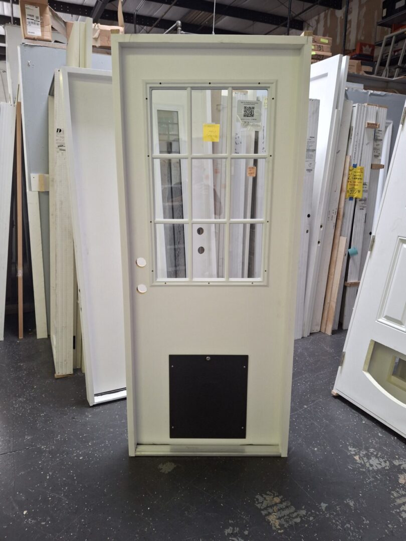 custom made door with doggie door installed